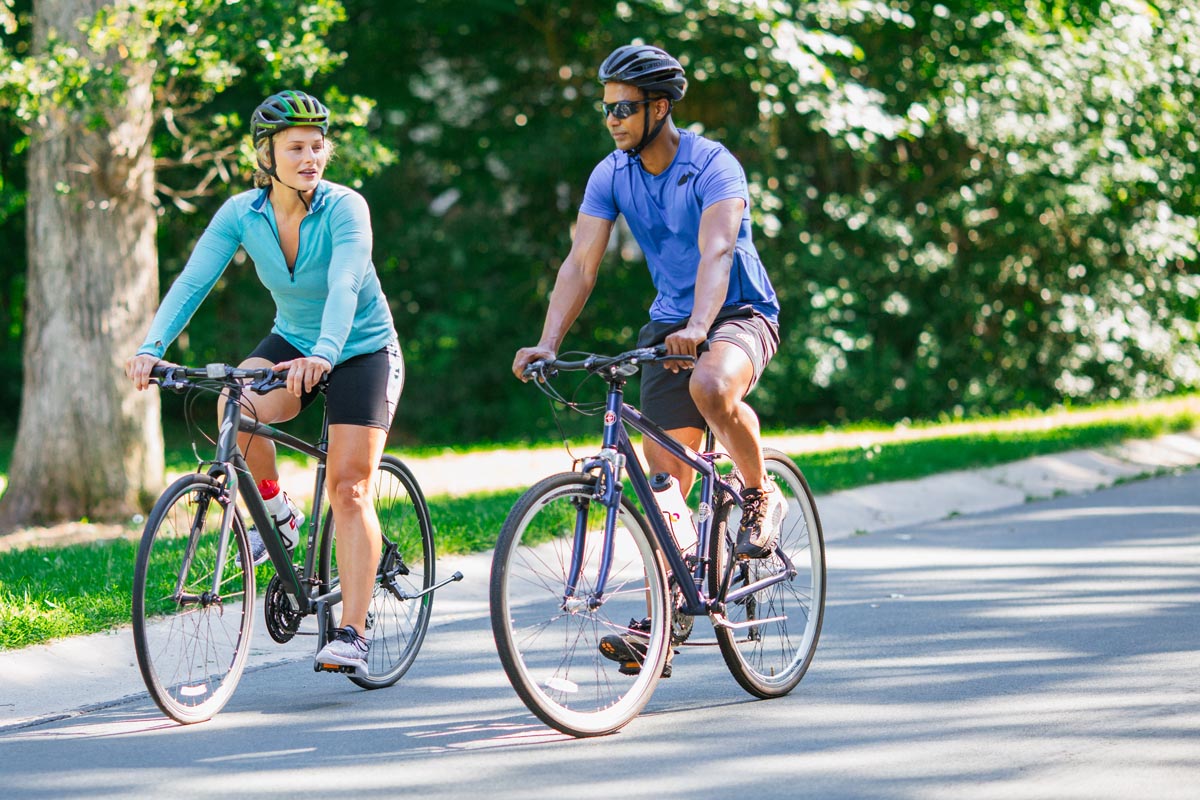 2 people biking
